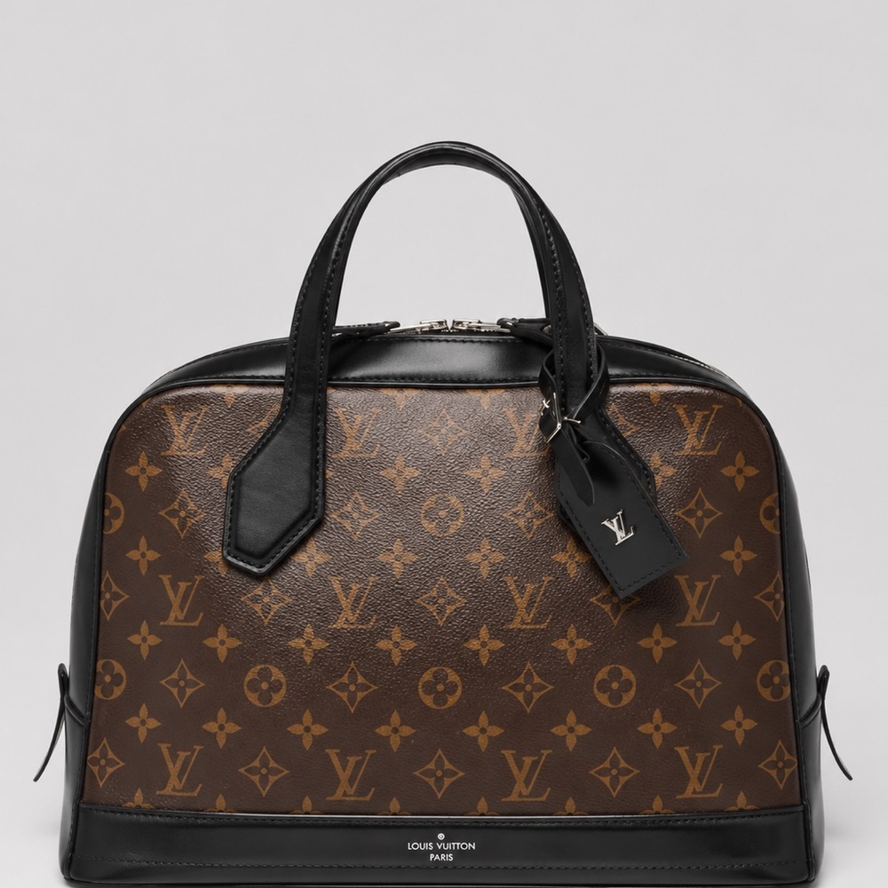 Louis Vuitton Dora Handbag 
Monogram Canvas and Calfskin 
Size MM